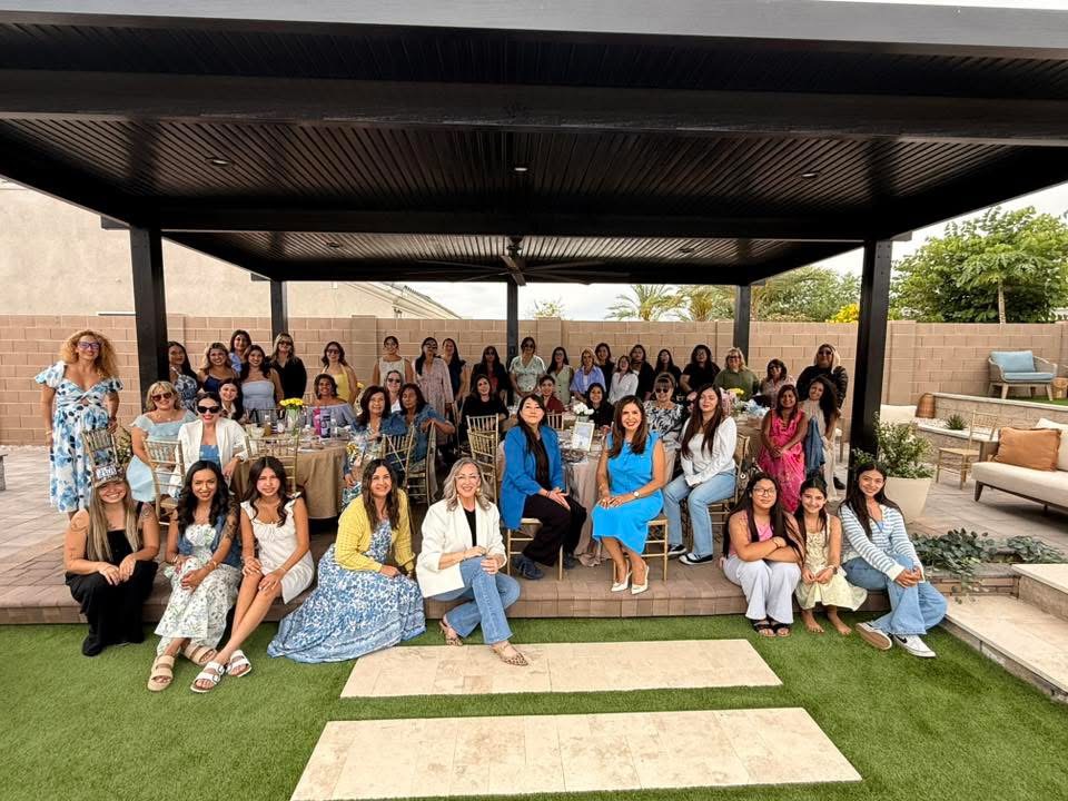AFG Living women's networking gathering under pergola