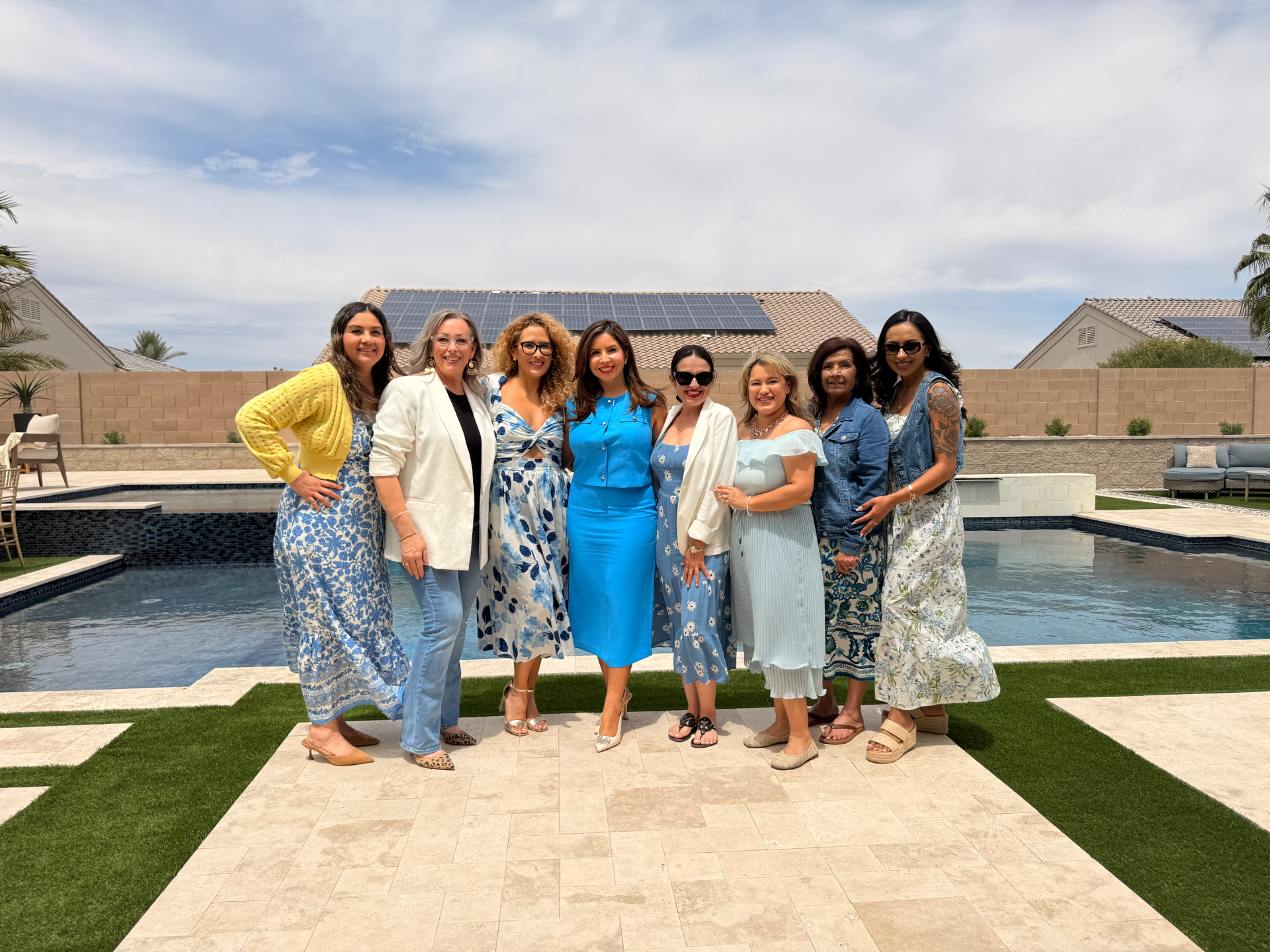 AFG Living leadership group by the pool